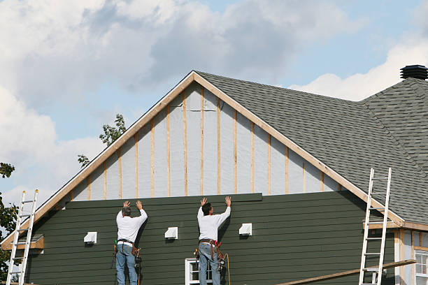 Professional Siding Contractor technician working in Highland Park, NJ